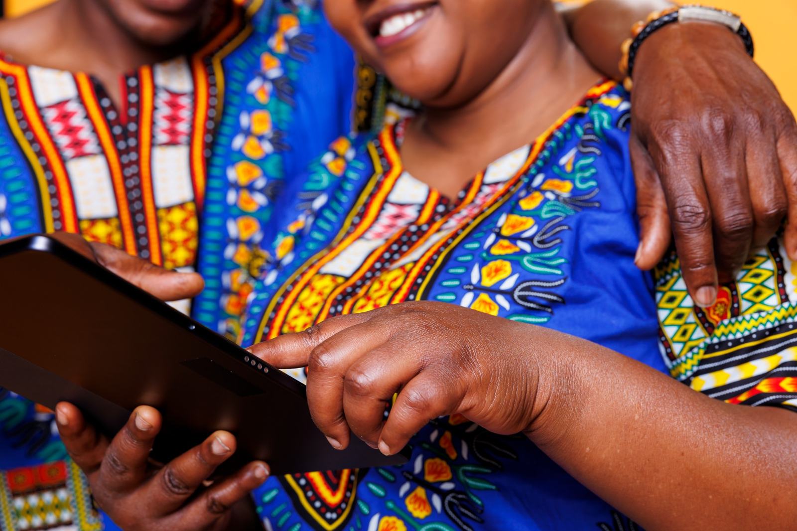 Users looking at a tablet